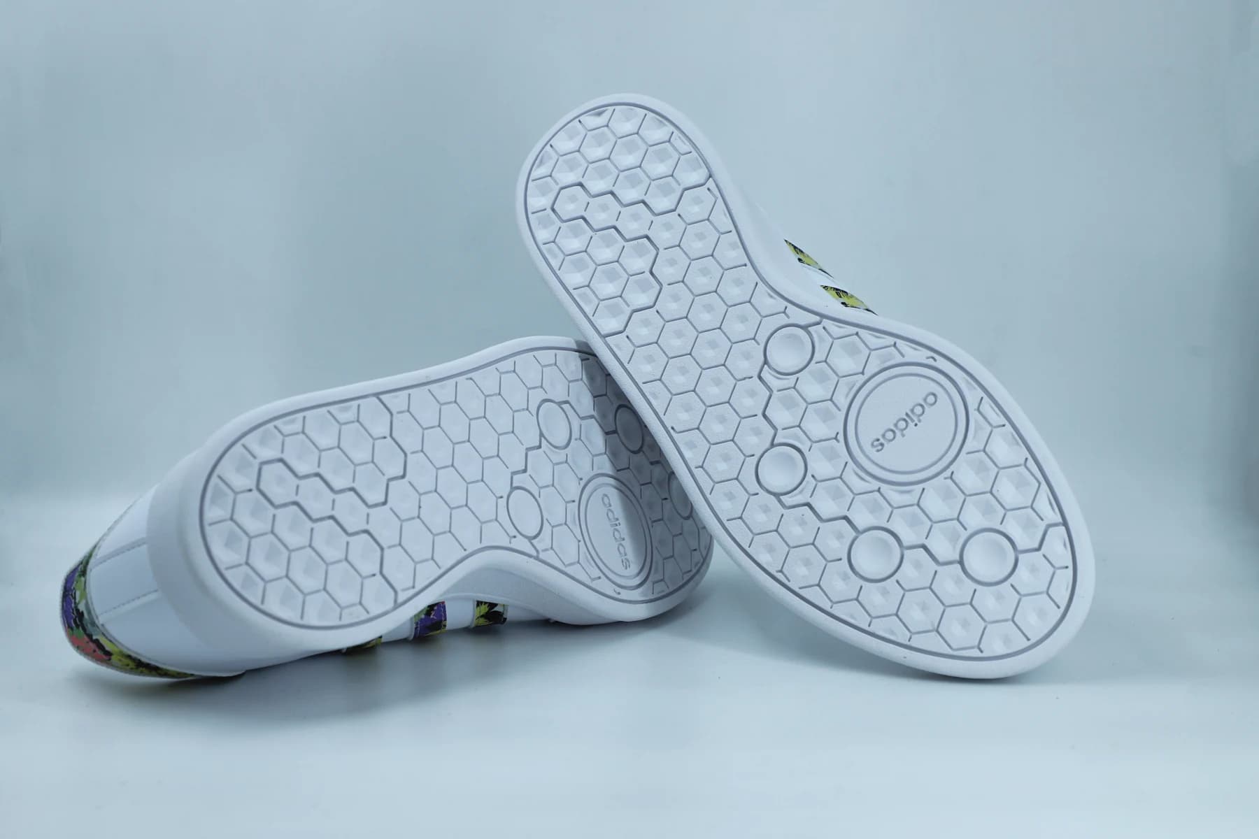 Close-up of the patterned sole of a white shoe